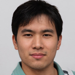 Neutral asian young-adult male with short  brown hair and brown eyes