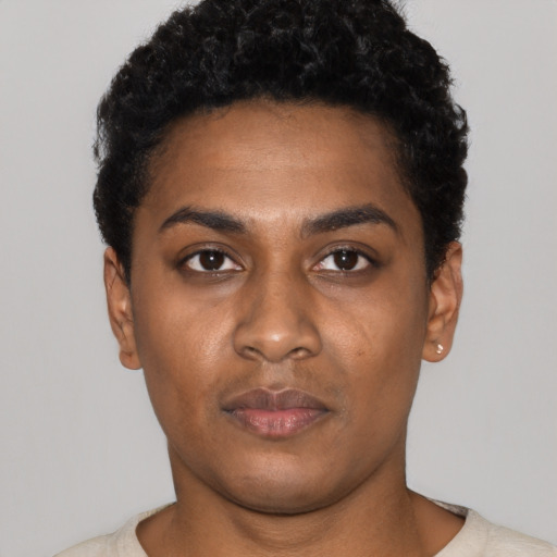 Neutral black young-adult female with short  black hair and brown eyes