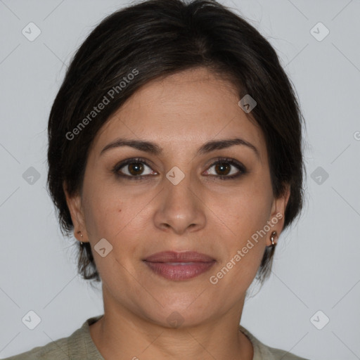 Joyful white adult female with medium  brown hair and brown eyes