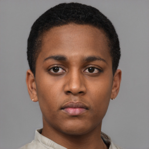 Neutral latino young-adult male with short  brown hair and brown eyes