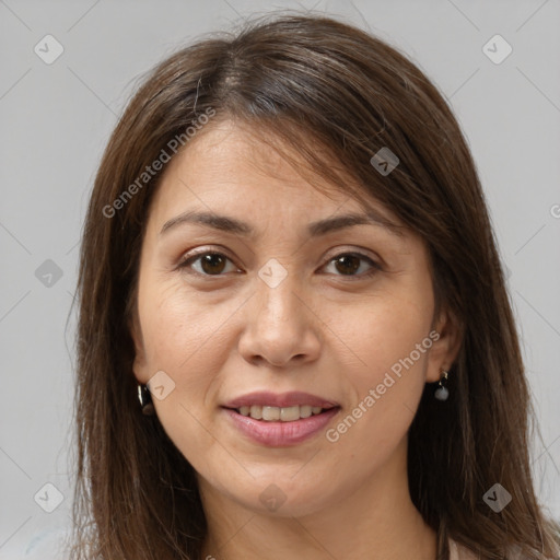 Joyful white adult female with medium  brown hair and brown eyes