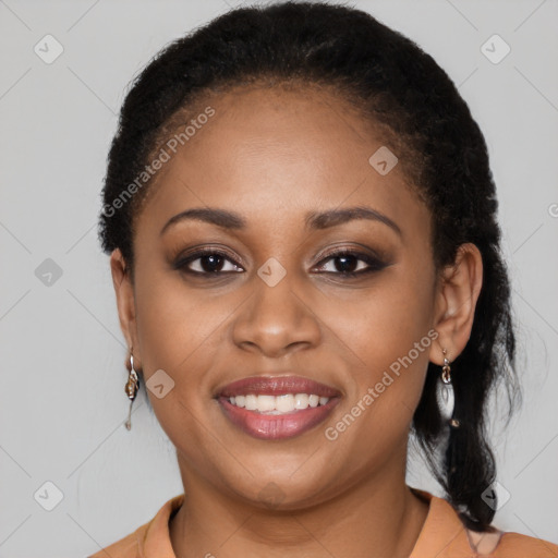 Joyful latino young-adult female with long  brown hair and brown eyes