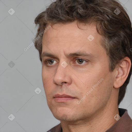 Neutral white adult male with short  brown hair and brown eyes