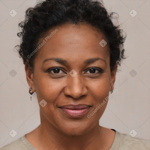 Joyful black adult female with short  brown hair and brown eyes