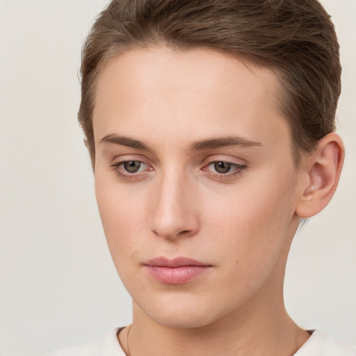 Neutral white young-adult female with short  brown hair and brown eyes