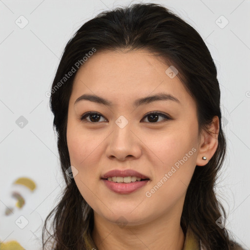 Joyful asian young-adult female with long  brown hair and brown eyes