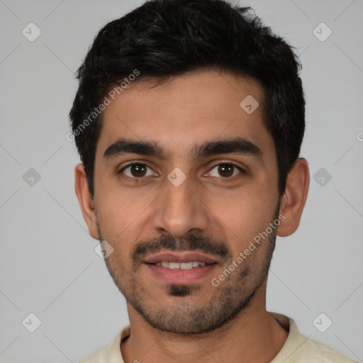 Joyful white young-adult male with short  black hair and brown eyes