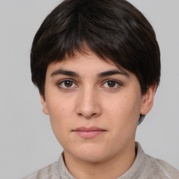 Neutral white young-adult female with short  brown hair and brown eyes