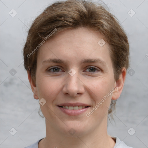 Joyful white young-adult female with short  brown hair and grey eyes