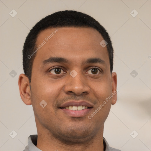 Joyful latino young-adult male with short  black hair and brown eyes