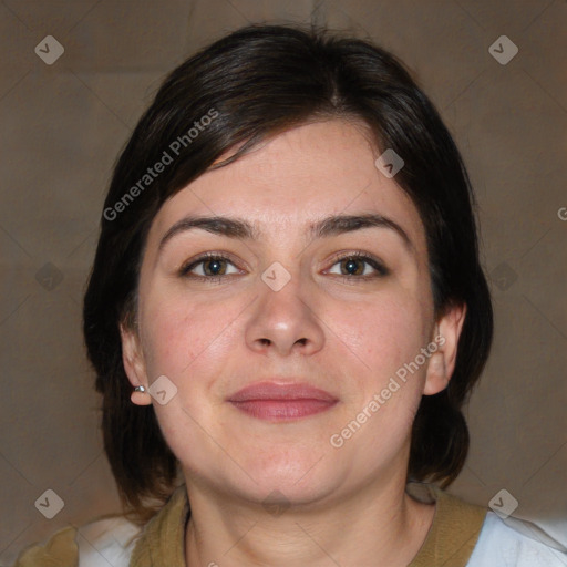 Joyful white adult female with medium  brown hair and brown eyes