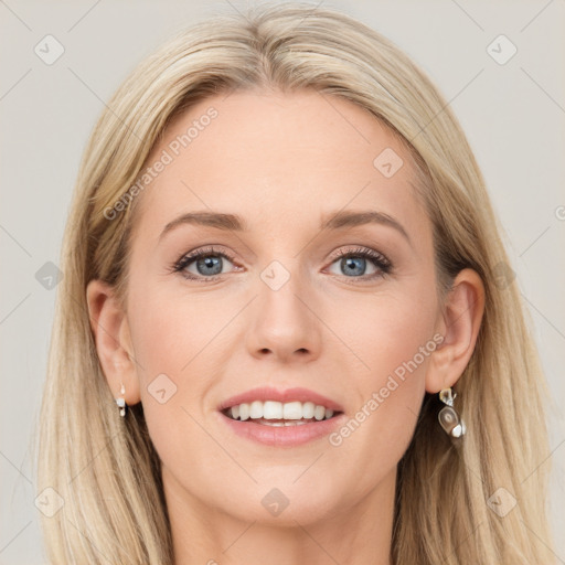 Joyful white young-adult female with long  brown hair and blue eyes