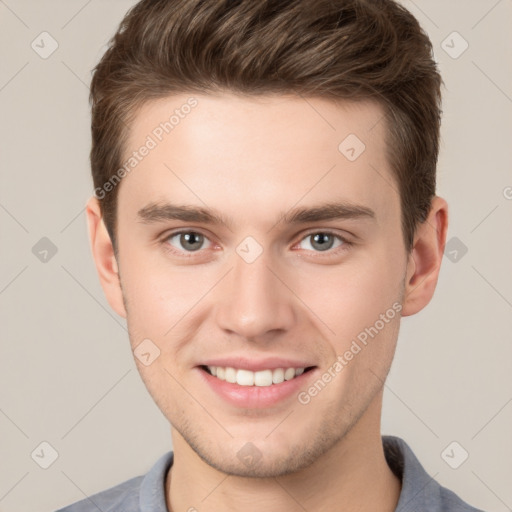 Joyful white young-adult male with short  brown hair and brown eyes