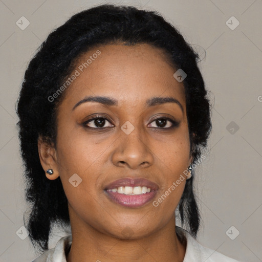 Joyful black young-adult female with medium  black hair and brown eyes