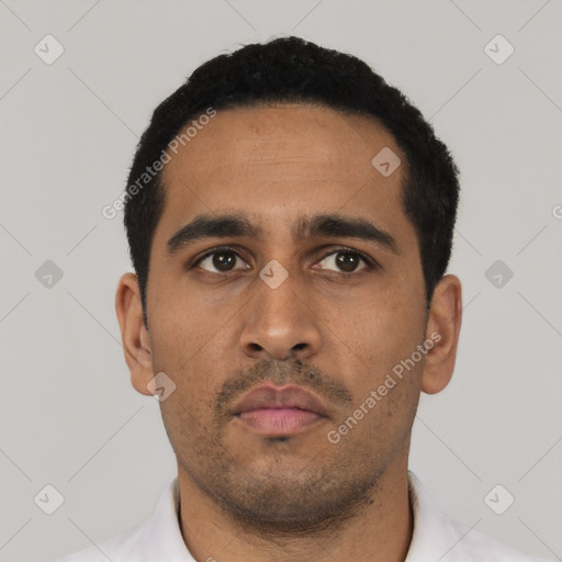 Neutral latino young-adult male with short  black hair and brown eyes