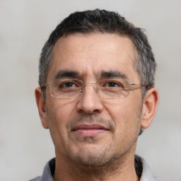 Neutral white adult male with short  black hair and brown eyes