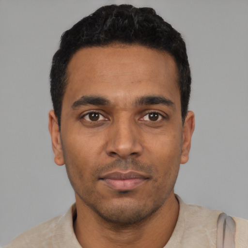 Neutral latino young-adult male with short  black hair and brown eyes