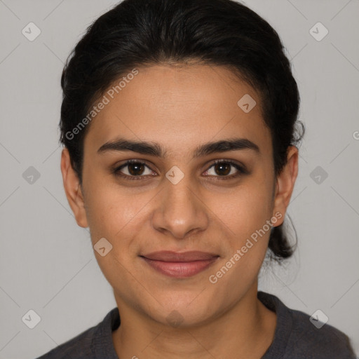 Joyful latino young-adult female with short  brown hair and brown eyes