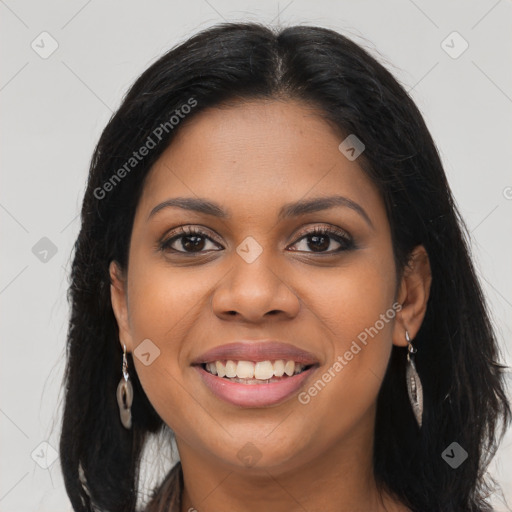 Joyful latino young-adult female with long  brown hair and brown eyes