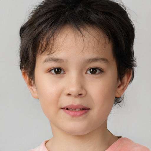 Joyful white child female with short  brown hair and brown eyes