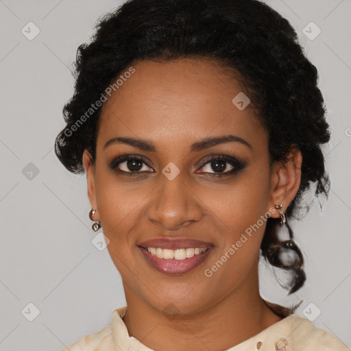 Joyful black young-adult female with medium  brown hair and brown eyes