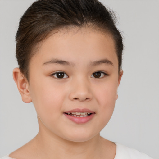 Joyful white child female with short  brown hair and brown eyes