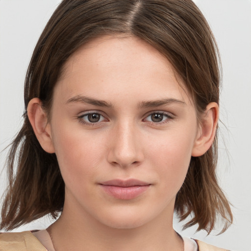 Neutral white young-adult female with medium  brown hair and brown eyes