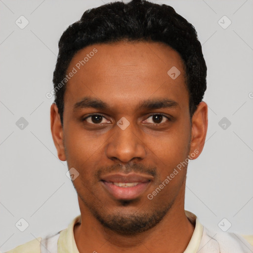 Joyful black young-adult male with short  black hair and brown eyes