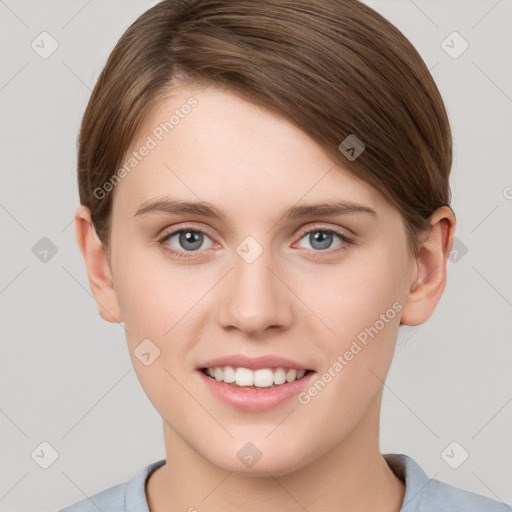 Joyful white young-adult female with short  brown hair and grey eyes