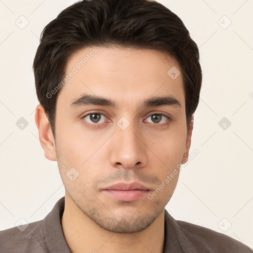 Neutral white young-adult male with short  brown hair and brown eyes