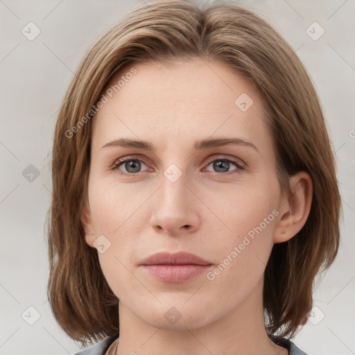 Neutral white young-adult female with medium  brown hair and grey eyes