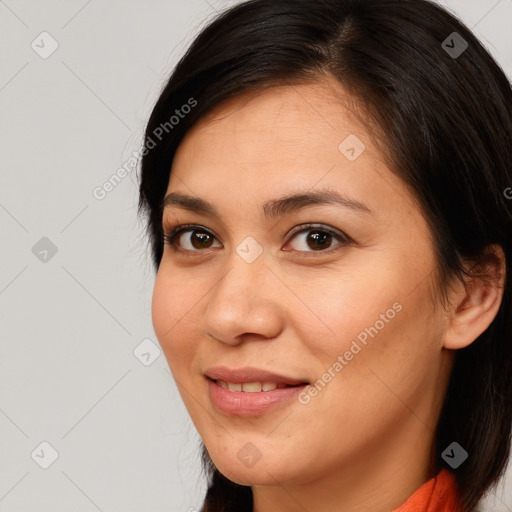 Joyful white young-adult female with medium  brown hair and brown eyes