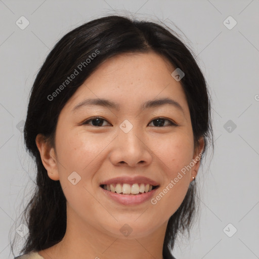 Joyful asian young-adult female with medium  black hair and brown eyes