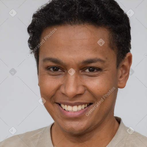 Joyful latino young-adult male with short  brown hair and brown eyes