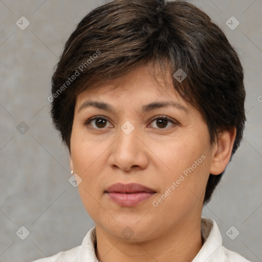 Joyful white adult female with medium  brown hair and brown eyes