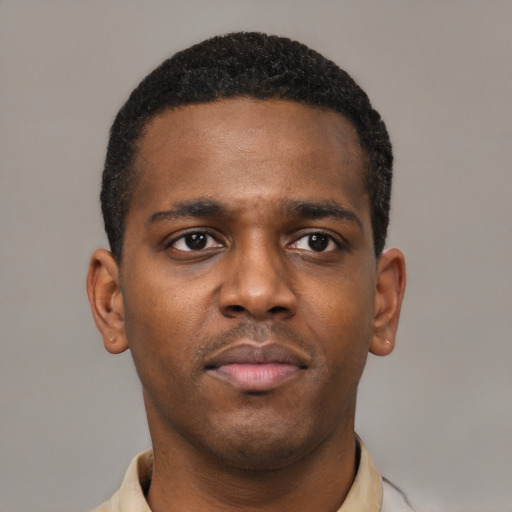 Neutral black young-adult male with short  black hair and brown eyes