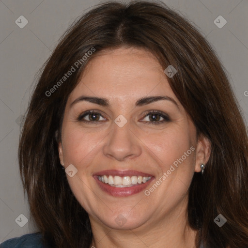 Joyful white adult female with medium  brown hair and brown eyes