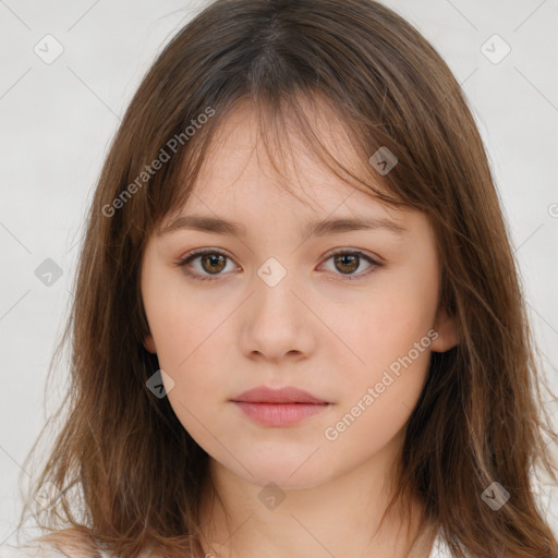 Neutral white young-adult female with long  brown hair and brown eyes