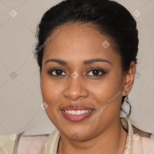 Joyful black young-adult female with long  brown hair and brown eyes