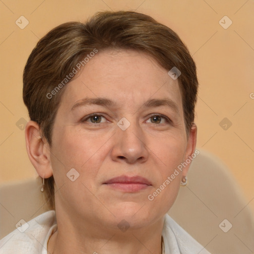 Joyful white adult female with short  brown hair and brown eyes