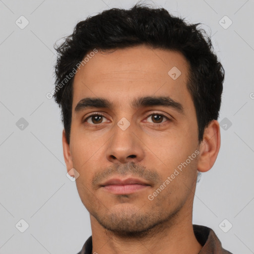 Neutral latino young-adult male with short  black hair and brown eyes