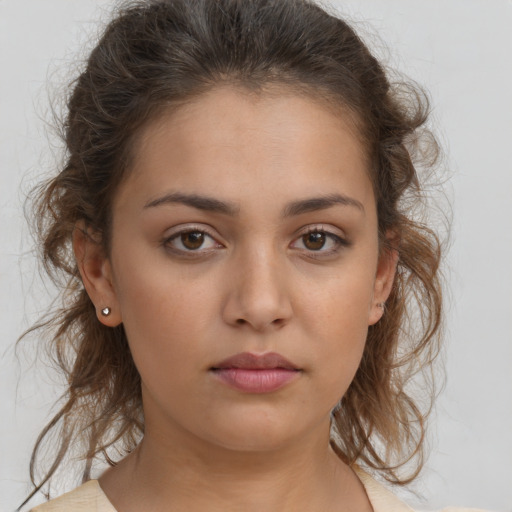 Neutral white young-adult female with medium  brown hair and brown eyes
