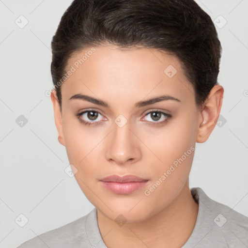 Neutral white young-adult female with short  brown hair and brown eyes