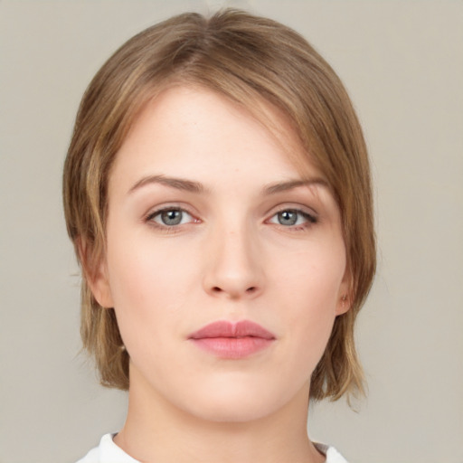 Neutral white young-adult female with medium  brown hair and green eyes