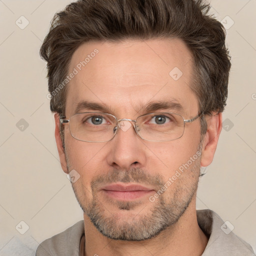 Joyful white adult male with short  brown hair and grey eyes