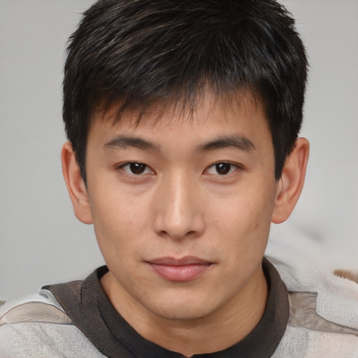 Neutral asian young-adult male with short  brown hair and brown eyes
