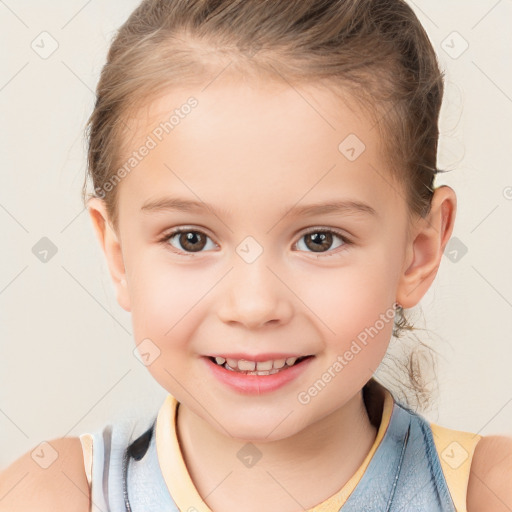 Joyful white child female with short  brown hair and brown eyes