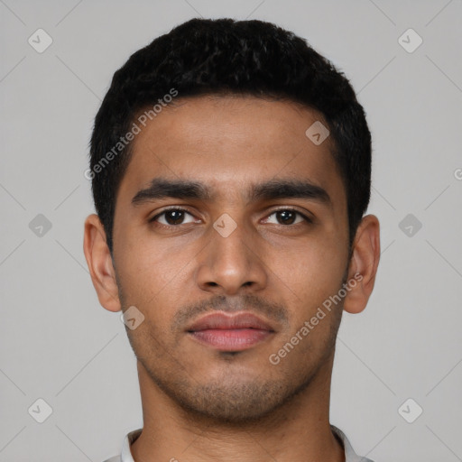 Neutral latino young-adult male with short  black hair and brown eyes