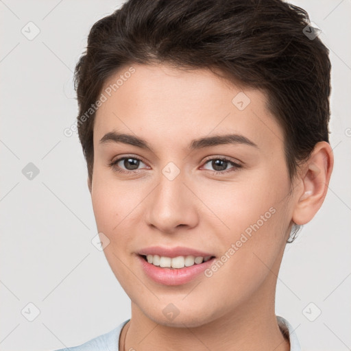 Joyful white young-adult female with short  brown hair and brown eyes