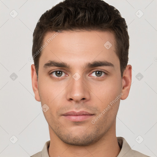 Neutral white young-adult male with short  brown hair and brown eyes